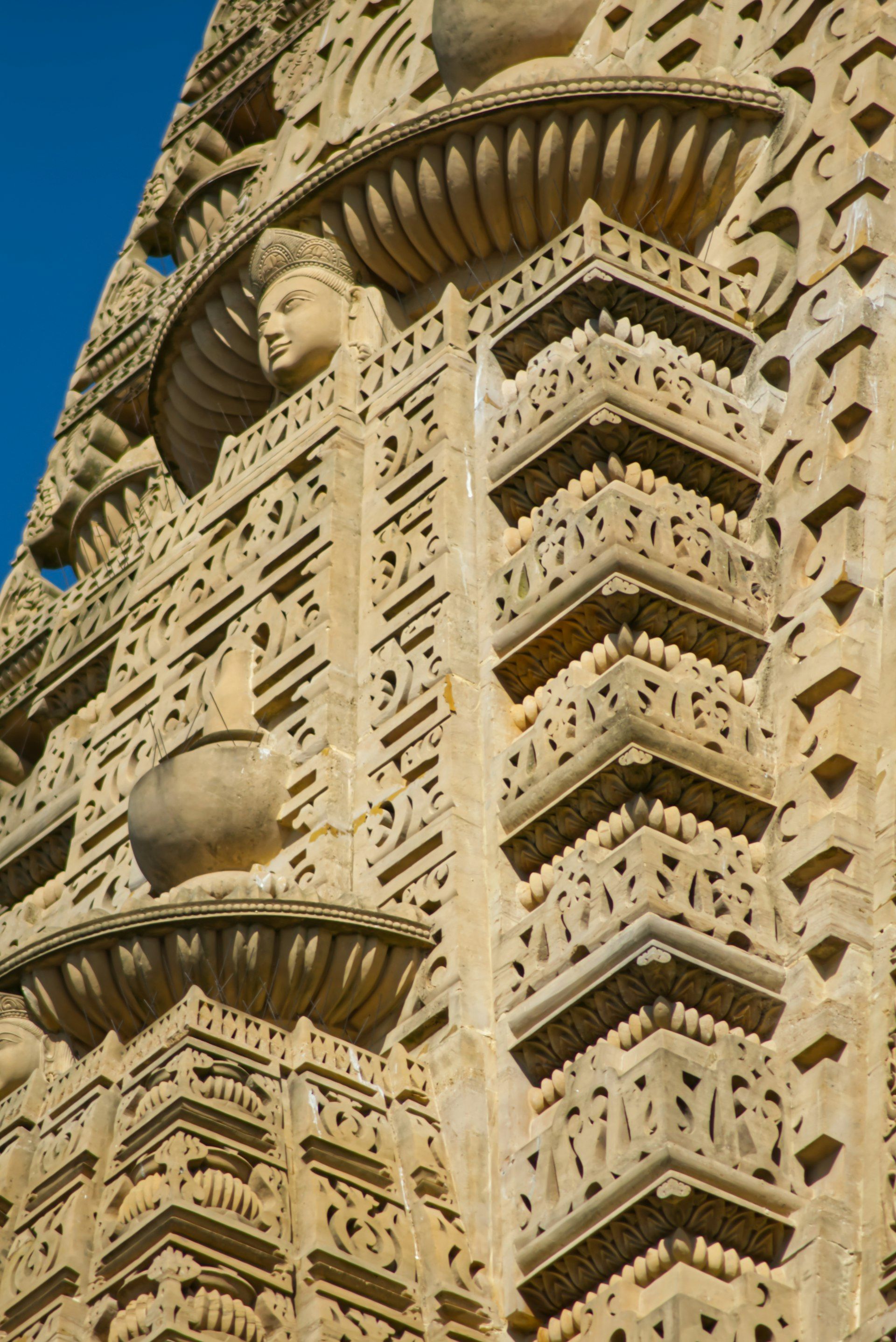 Intricate stone carvings adorn an ancient temple.